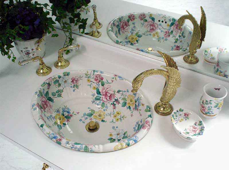 custom bathroom renovation idea with flowered sink and swan faucets