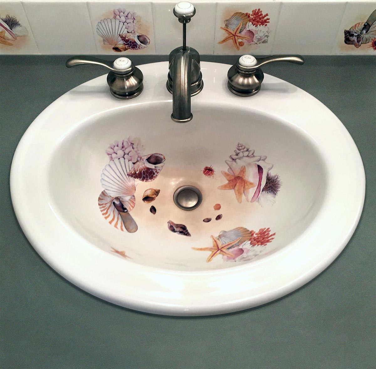 custom seashells hand painted sink and backsplash tiles for seaside beach bathroom