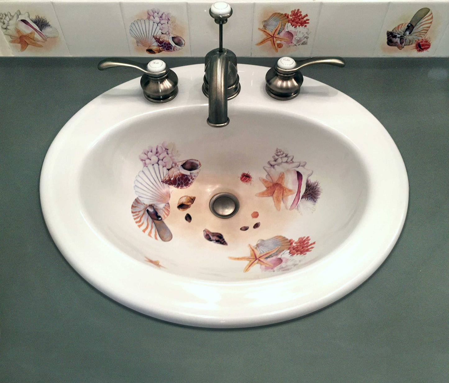 Kohler Pennington Drop-in sink painted with sea shells and starfish