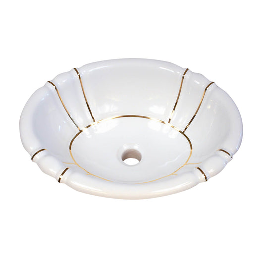 Real metallic gold bands painted on a fluted drop-in bathroom sink