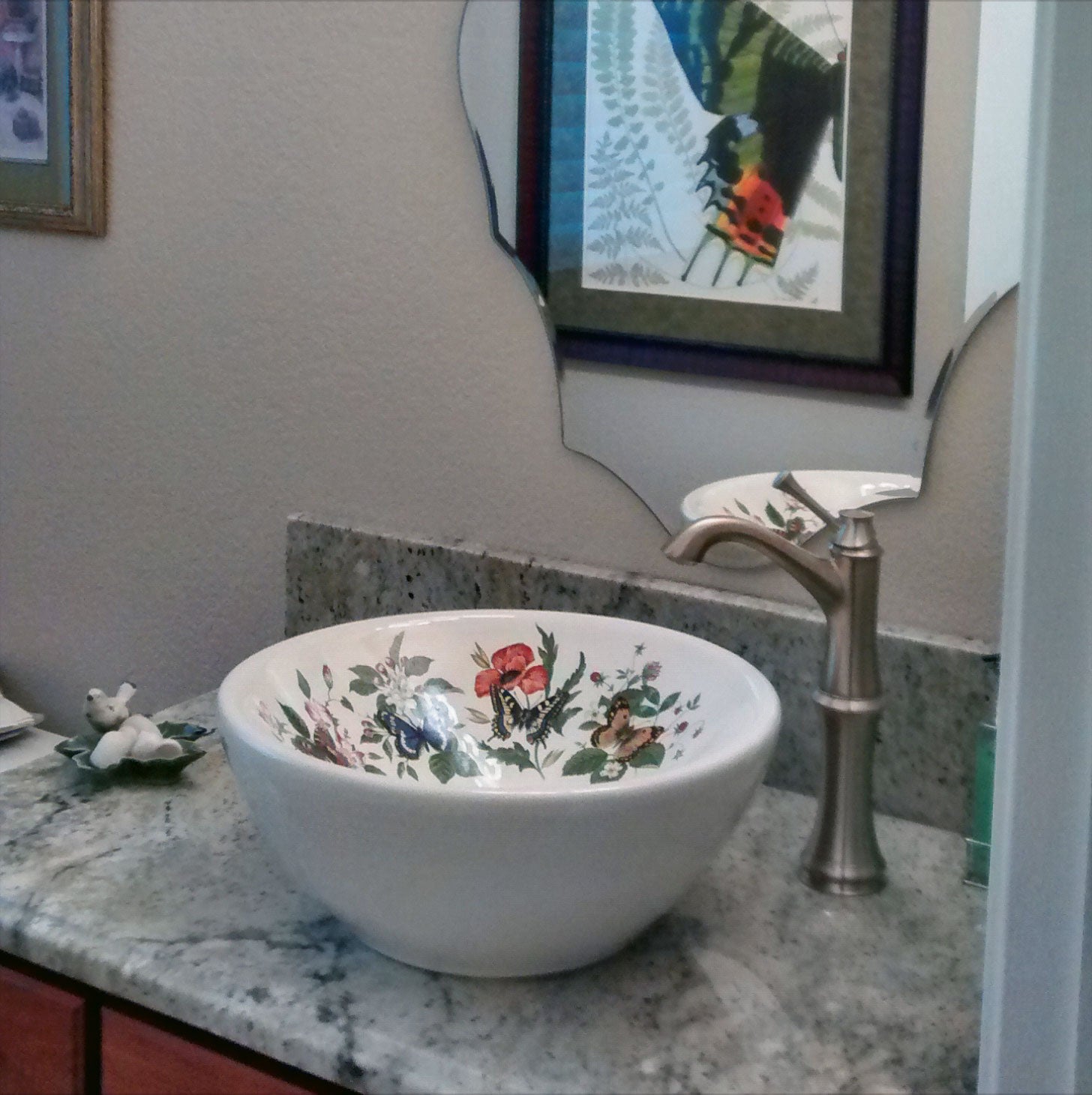 Powder room design inspiration butterflies flowers painted vessel sink