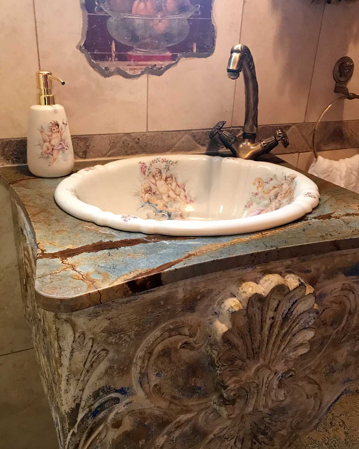bathroom design idea cherubs painted sink in distressed vanity