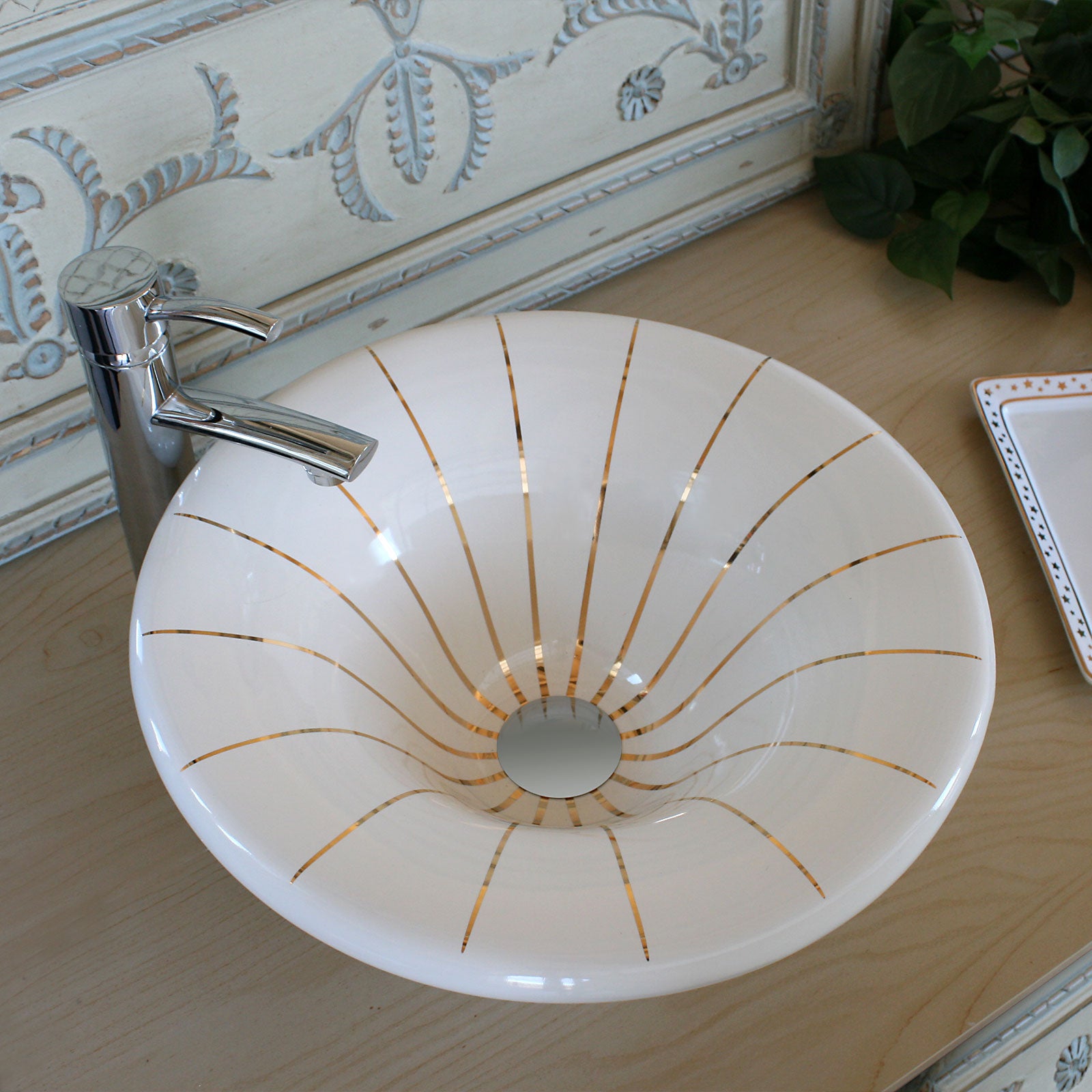 French provincial powder room with gold lines painted on vessel wash basin