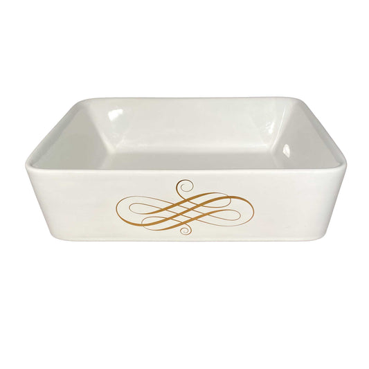 Elegant swirl painted in gold on a white rectangle vessel sink