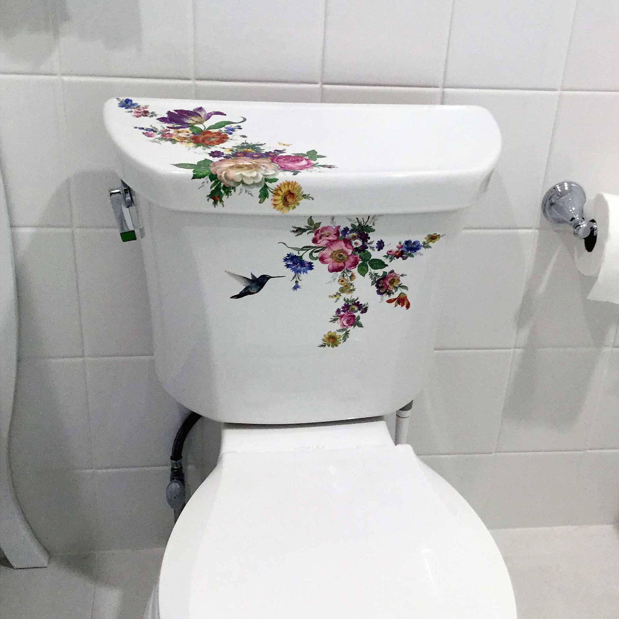 hand painted kohler toilet decorated with flowers and hummingbird and butterflies
