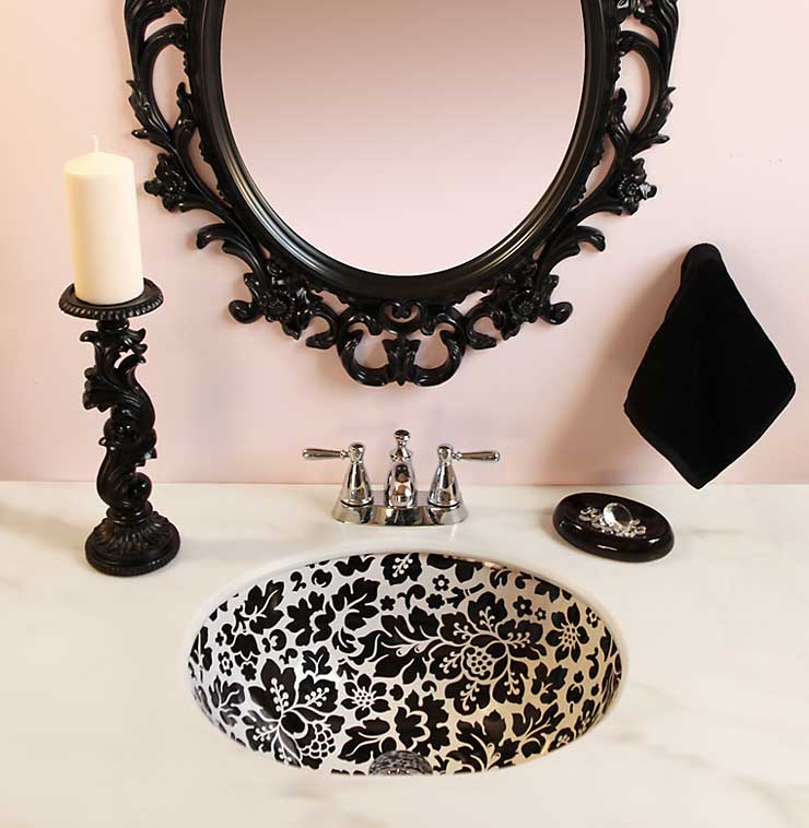 Pink Powder Room with really cool hand painted black and white sink