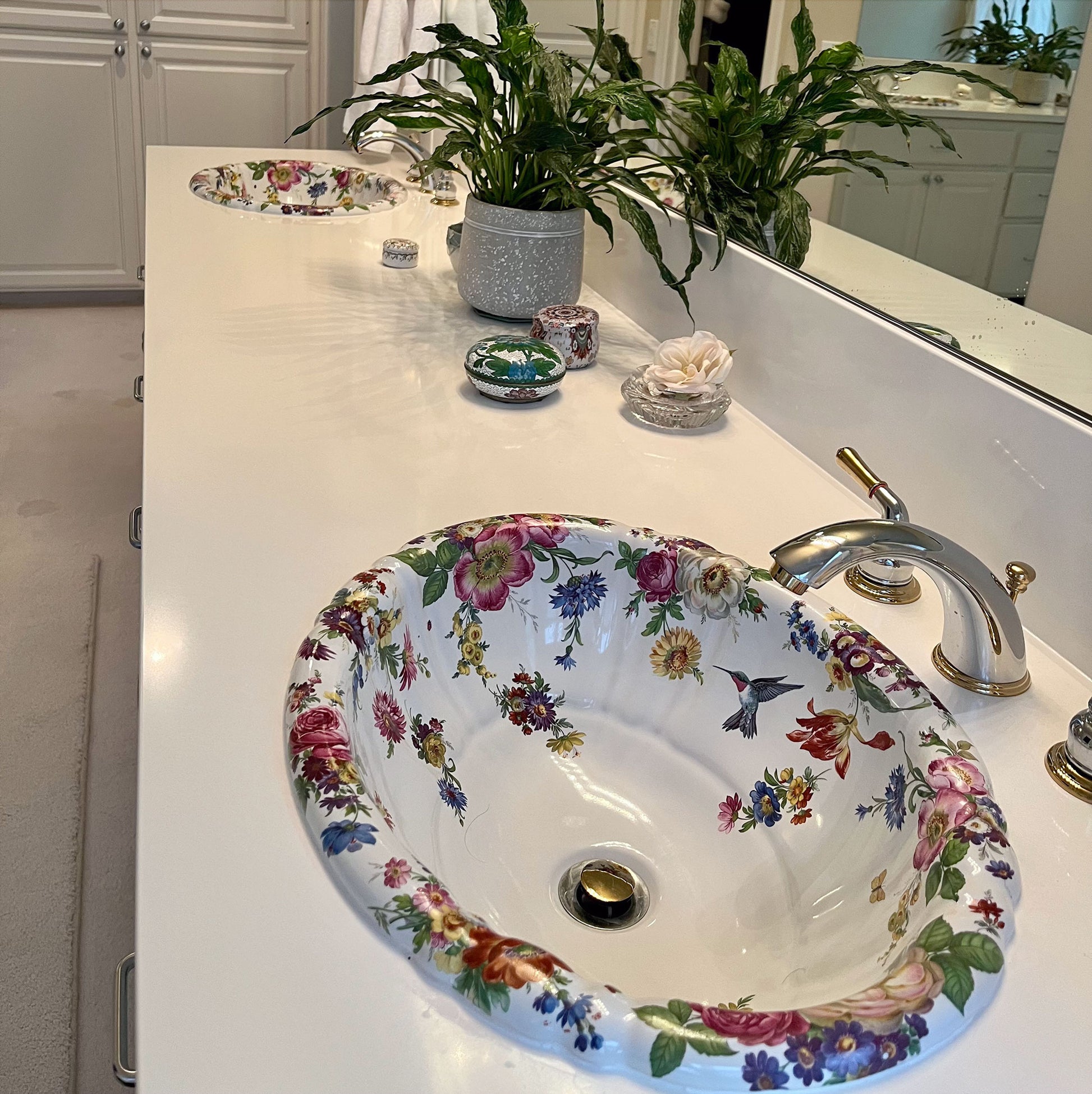 Master bathroom sinks painted with flowers and hummingbird