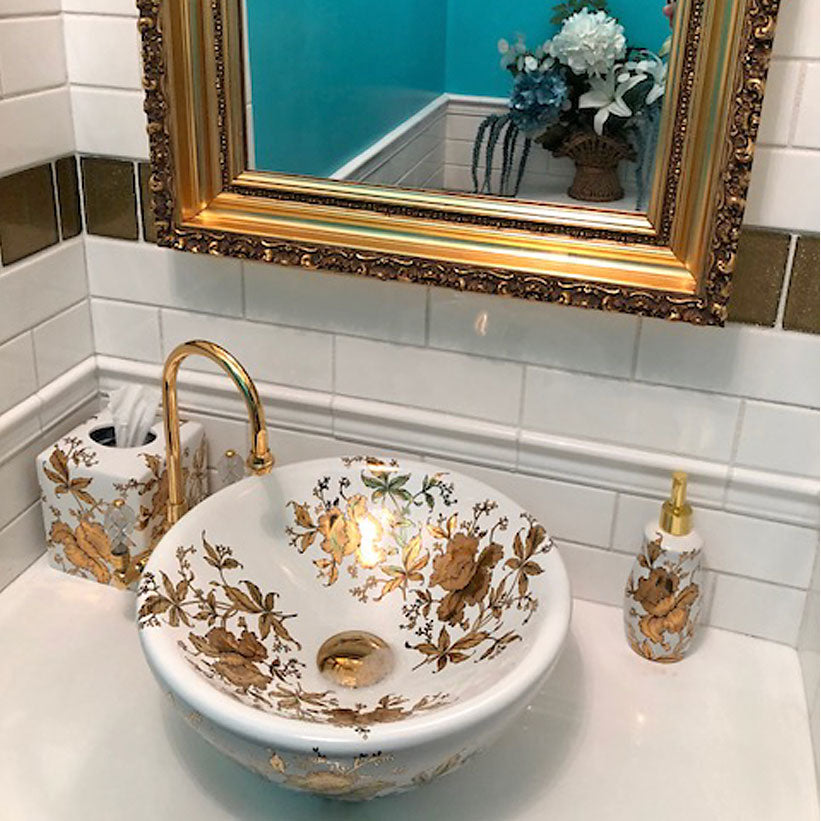 turquoise bathroom with gold orchids vessel sink and accessories