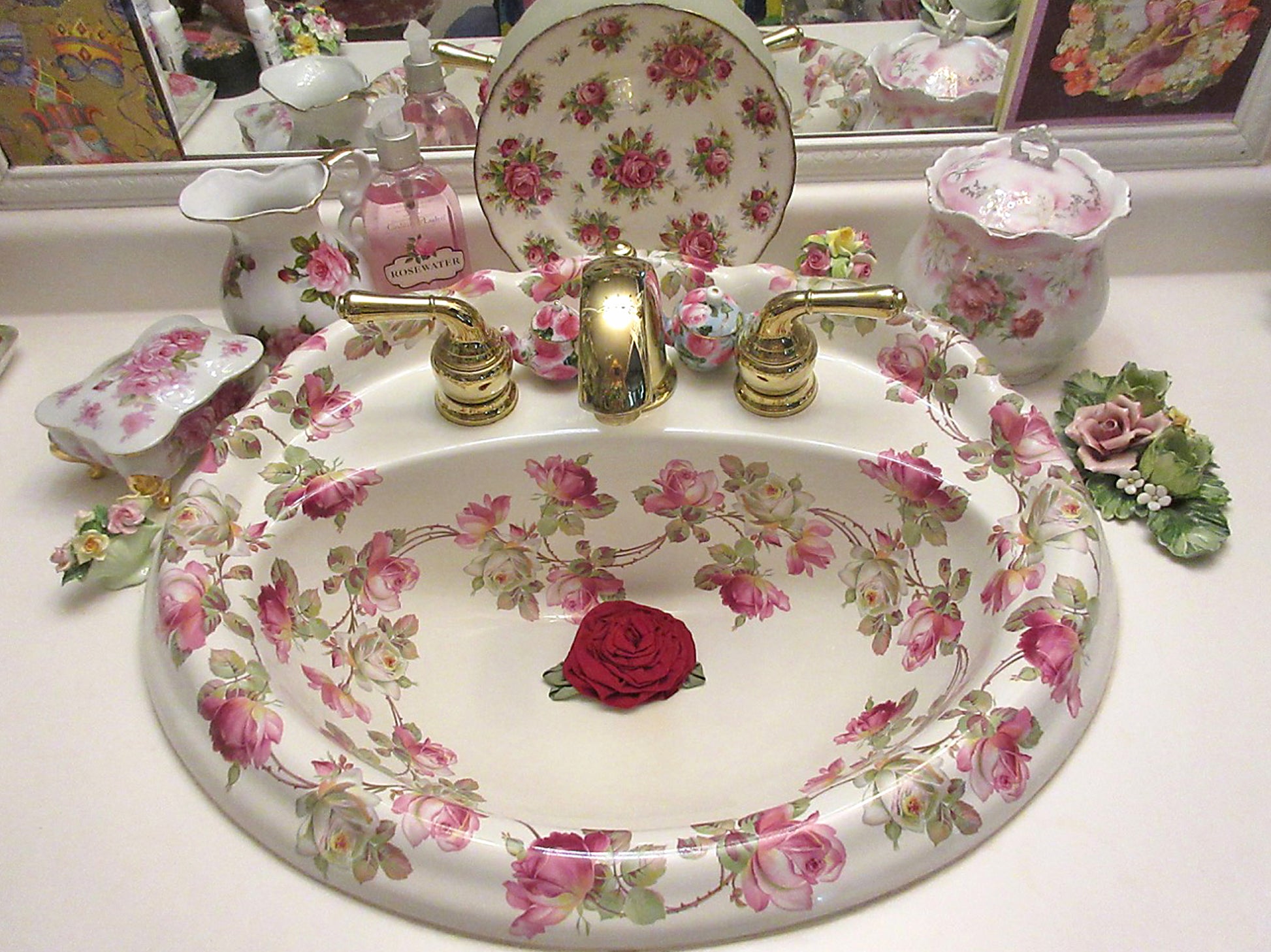 Fancy bathroom sink painted with roses