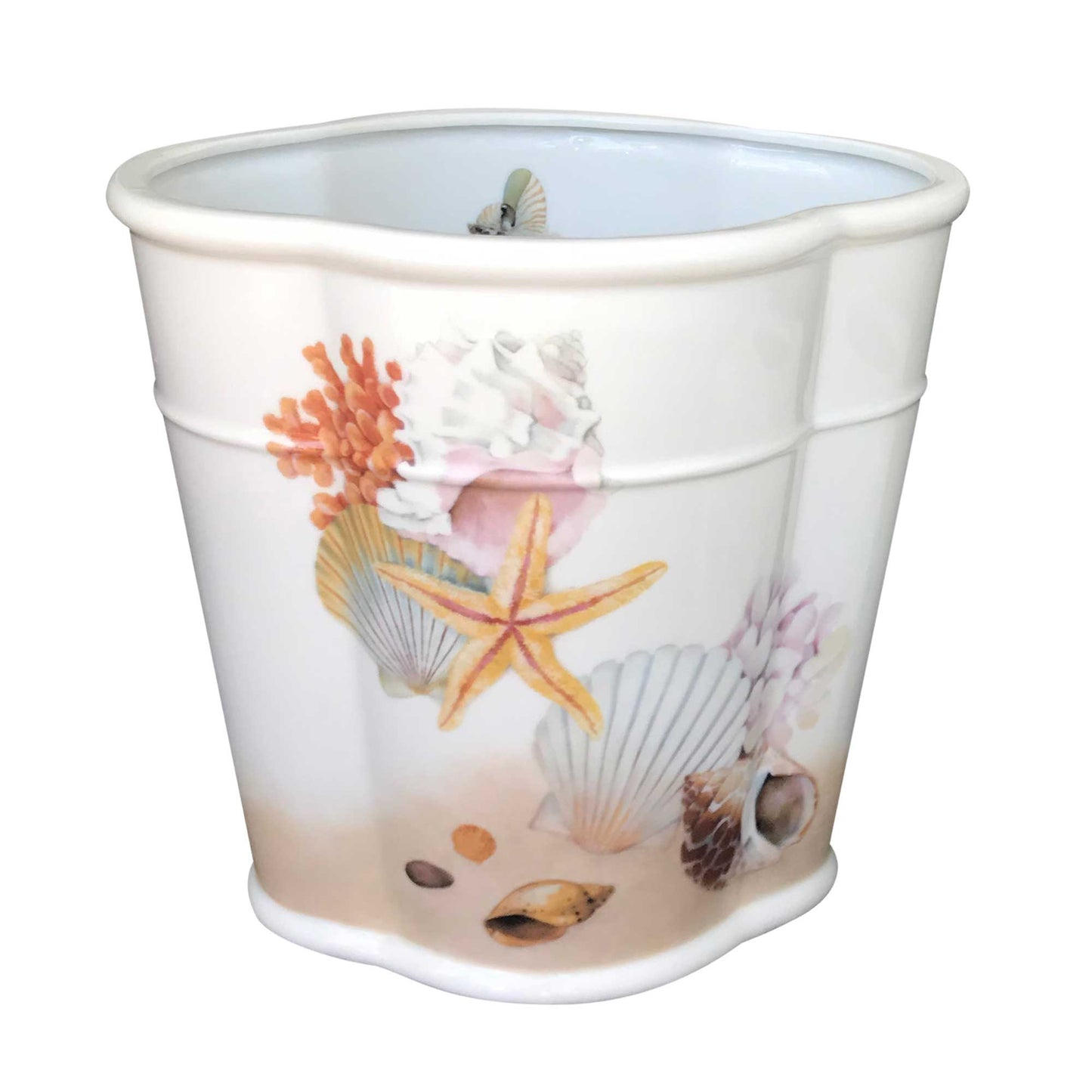 white ceramic waste basket painted with shells and starfish